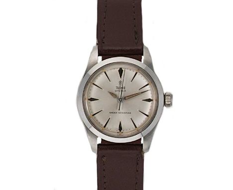 circa 1956, model 7029, the signed circular silvered dial, 25mm diameter, with silver coloured batons, hands and centre sweep