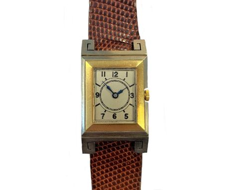 circa 1925, the unsigned rectangular silvered dial, 15mm wide with black Arabic numerals and baton markers, blued hands and i