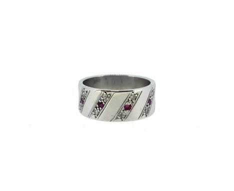 four diagonal lines, each set with a round faceted ruby flanked by a single cut diamond, estimated approximate total diamond 