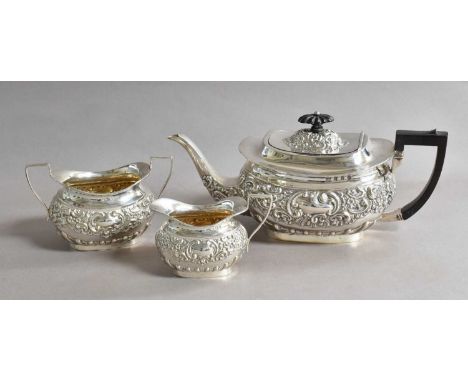 A Three-Piece Victorian and Edward VII Silver Tea-Service, by William Henry Leather, Birmingham, The Teapot 1899, The Cream-J