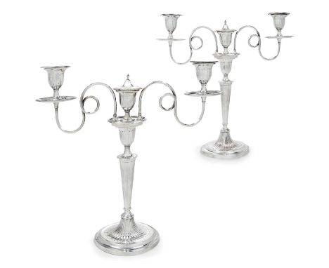 A Pair of Silver Plate Three-Light Candelabra, Apparently Unmarked, Probably First Half 19th Century, each on fluted oval bas