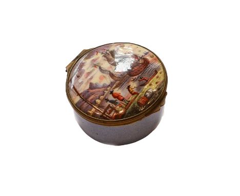 An 18th century South Staffordshire enamel circular box, painted to the cover with a harbour scene incorporating two ships an