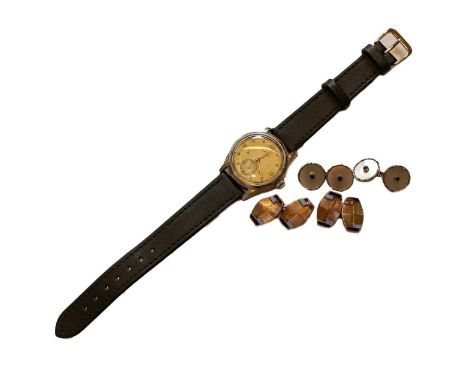 An Eterna wristwatch; a pair of enamel cufflinks; and a pair of mother-of-pearl cufflinks, stamped '18CT'Mother-of-pearl cuff