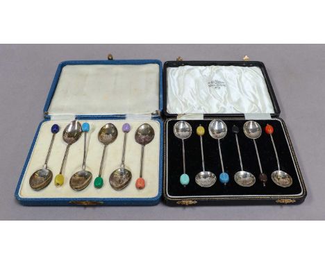 A Collection of Assorted Cased Sets of Spoons, comprising: two sets of six coffee-spoons, each with differing composition bea