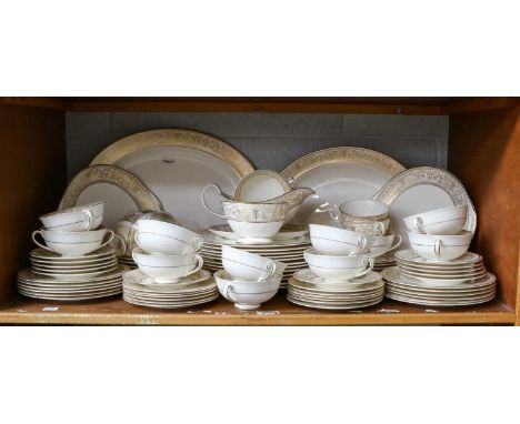 A Royal Doulton ''Sovereign'' pattern part tea/dinner service comprising, two oval serving dishes, twelve dinner plates, twel