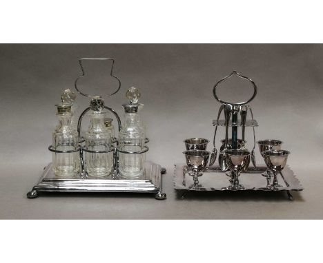 A silver plated six bottle cruet set, an egg set, fluted teapot and a hot water jug; together with a brass spice mill, a bras