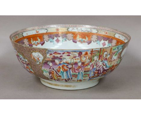 A Chinese porcelain punch bowl, Qianlong, painted in famille rose enamels with figures in gardens and landscapes within panel