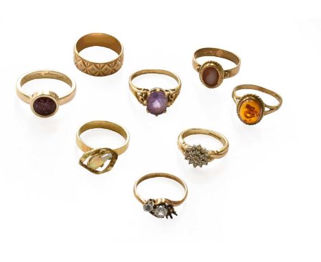 A 9 carat gold amethyst ring, finger size Q; a 9 carat gold diamond cluster ring, finger size I; a 9 carat gold amber type ri