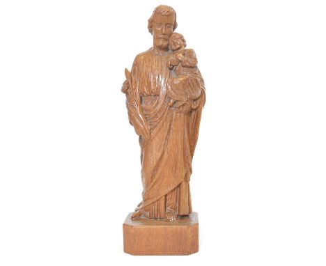 Robert Thompson, mid 20th Century Mouseman carved religious oak figure of Saint Anthony of Padua on adzed base and carved rel
