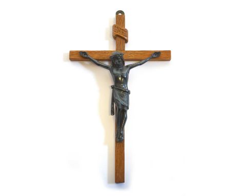 Robert Thompson, Mouseman oak crucifix with cast metal figure of Jesus. Carved signature to the rear of the cross. 24cm high