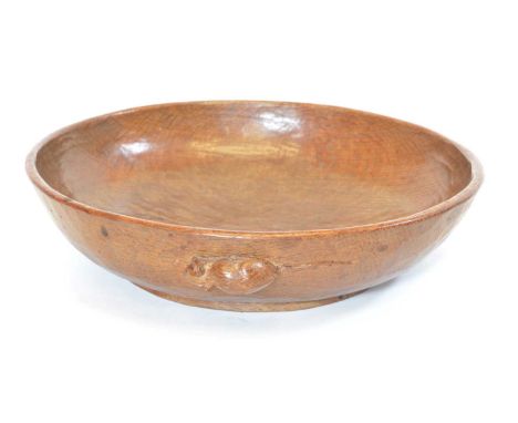 Robert Thompson, Mouseman oak bowl with adzed surface and carved mouse signature to outside of bowl 26cm diameter.Stain to th