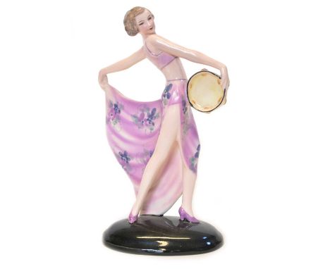 Art Deco Goldscheider Figure, designed by Josef Lorenzl of a female Tarantella dancer in a pink floral dress with a tambourin