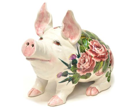 Large Wemyss pig in cabbage rose and thistle pattern, signed to the underside 'Wemyss Ware, EXON 1265, B. Adams'. 44cm long