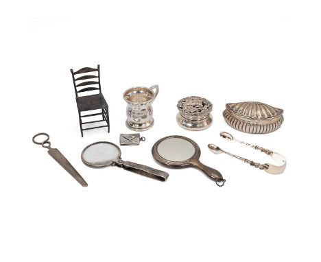 Collection of silver hallmarked items, including sugar nips, a toddy cup, a ring box in the form of a clam, and other items. 