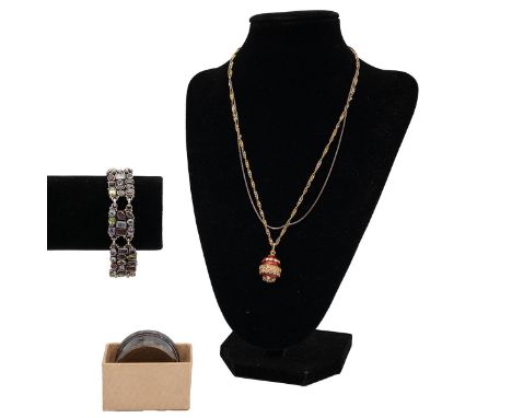9ct gold necklace and egg pendant (gross weight 10.5 grams), a silver napkin ring (stamped 'ST.SILV', 35.2 grams), vintage st