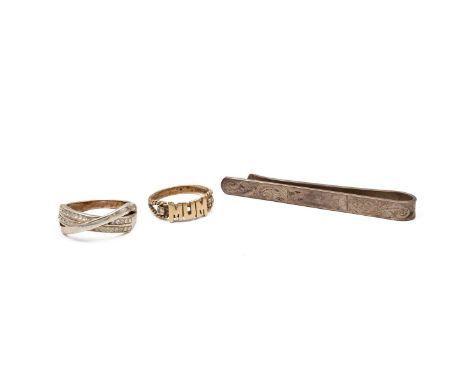 Two rings including a 9ct gold (tested) with the words mum, 2.1 grams, a decorative dress ring and a silver tie clip, 8.9 gra