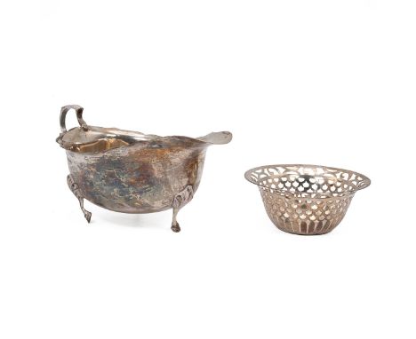 Silver sauce boat with fluted rim, raised on horse shoe supports, hallmarked Sheffield 1946, maker Walker &amp; Hall; and a s