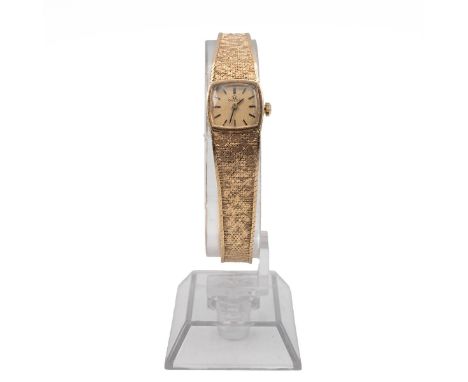 Vintage Omega 9ct gold ladies cocktail watch. 15mm rectangular 9ct case and 9ct articulated bracelet, manual wind, gold tone 