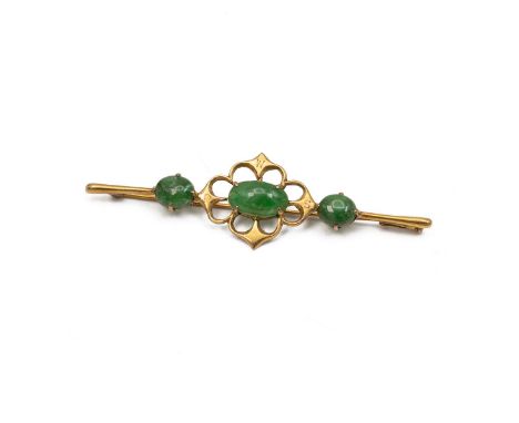 14ct gold hallmarked Chinese three stone jade brooch, with pierced mount, weight 2.4 grams.