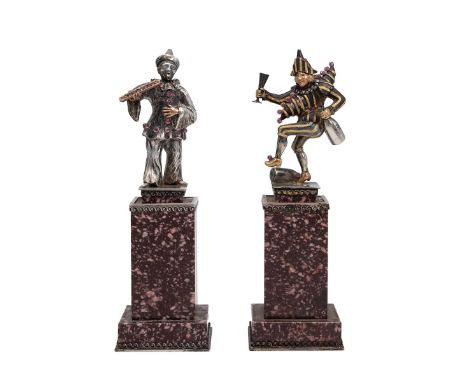Pair of 20th Century models of a clown and jester, each set with old cut diamonds, rubies and gold highlights. The clown hold