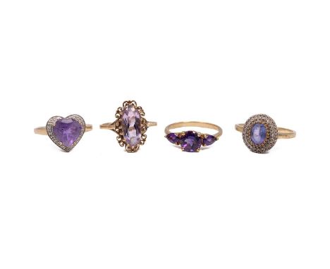 9ct gold hallmarked amethyst set rings, three stamped 375 and one 9K. Each ring of a different design, two rings size T and t