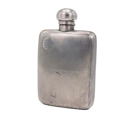 Goldsmiths &amp; Silversmiths Company, silver oversized hip flask with removable cup to base and engine turned decoration, ha
