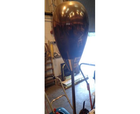 Unusual stainless steel standard lamp with glass shade 
