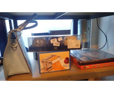 Shelf of mixed items including LP's, table lamp, pasta machine, handbag etc 