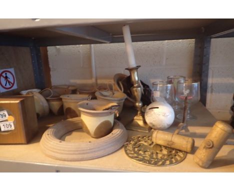 Shelf of mixed items including stoneware, brass, clock etc