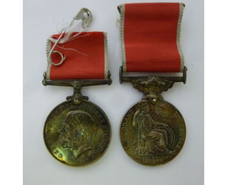 A Great War Service Medal, inscribed 5371 AWO  CL 1 C. Smith, Lincs R; and a George V Empire Medal, on a ribbon, inscribed Wo