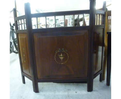 An Edwardian mahogany triptych firescreen with a spindle turned gallery, raised on rectangular legs  33''h  21''w       BSR