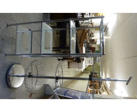 A modern chromium plated four tier shelf with inset glass panels  38''h  13''w; and a similar three tier shoe rack  46''h  14