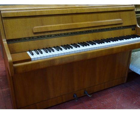 Light wood Bentley upright piano