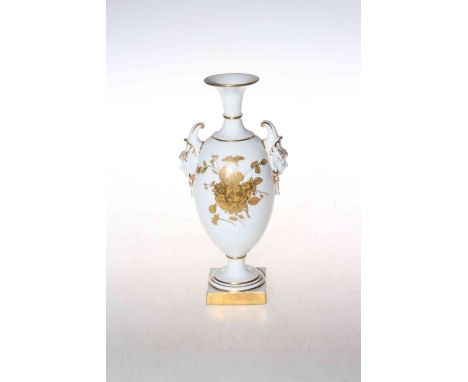 Royal Worcester two handled vase, having gilt flower bouquets on white ground and mask side handles, black back stamp and sha