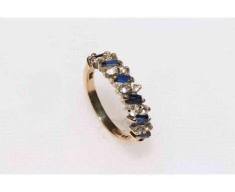 9 carat gold sapphire half eternity ring.