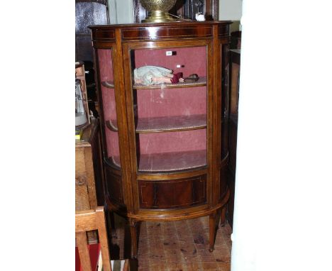 Edwardian mahogany and line inlaid bow front vitrine.
