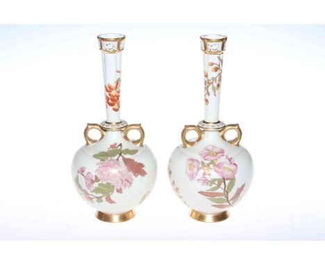 Pair Royal Worcester vases, painted and gilt with flowers on matt ivory ground, slender necks with pierced rim, printed and i