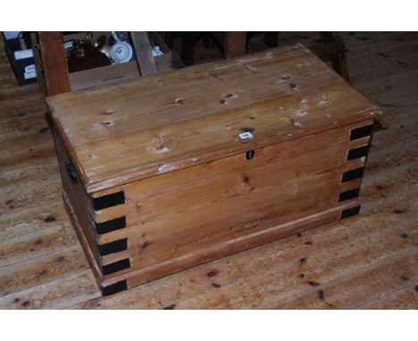 Pine and metal bound trunk, 43cm by 89cm.
