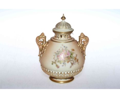 Royal Worcester pot pourri vase and cover, with painted and gilt flowers on blush ground, gilt highlighted moulded decoration