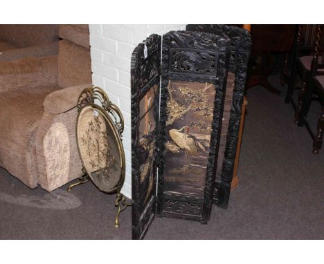 Carved Oriental four fold screen and brass mirror firescreen (2).
