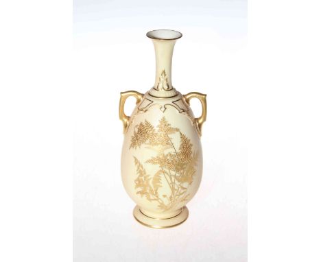 Royal Worcester two handled vase, decorated in gilt with ferns and wild flowers on shaded ground, shape no. 1792, 20cm.