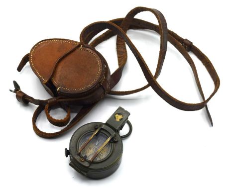 Post War British military compass by Stanley London together with extra leather prismatic compass pouch