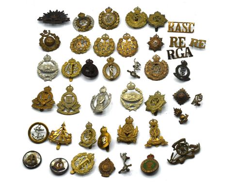 Quantity of 20th century British military cap badges with kings crowns to include Royal Engineers, economy plastic Royal corp