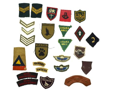 Quantity of Rhodesian Bush War insignia to include C (Rhodesia) squadron SAS padded wings, Pair of Southern Rhodesia Shoulder