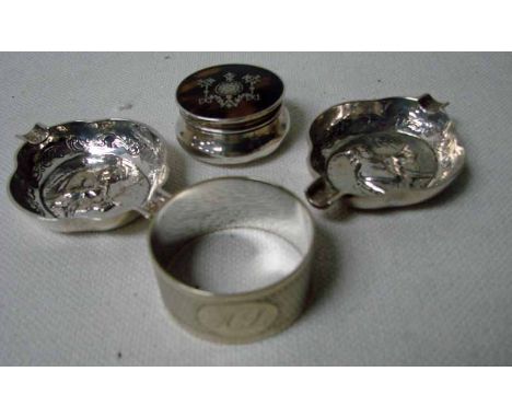 A silver pill box of squat circular form with tortoiseshell and silver pique decorated pull off cover, Birmingham 1910, a sil