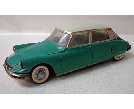 Gé Gé (France) a jade green and white plastic model Citroen DS19, battery powered friction motor, used condition, no box, 26.