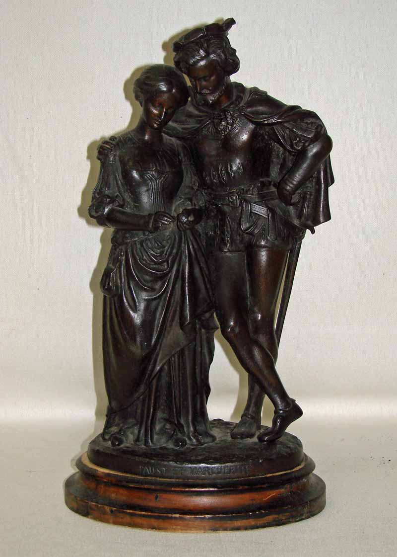 A late 19th century French bronze patinated figural group, Faust et ...