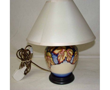 A modern Moorcroft trial design lamp of bulbous form, 20cm high 
