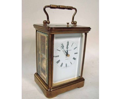 A 20th century carriage clock by Matthew Norman, corniche brass case with bevelled glass panels, Swiss eight day repeater mov