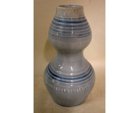 An unusual Moorcroft pottery vase of double gourd form, coil decoration in Robins egg blue glaze, impressed signature and mar
